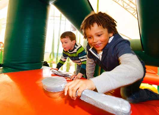 Children on the inflatable slide
