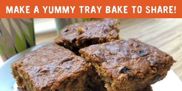 Text and carrot cake image: 'Make a yummy tray bake to share!'