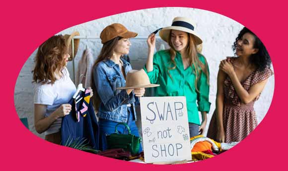 Women at a swap shop clothes sale