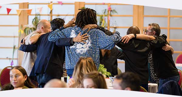 Community group hugging