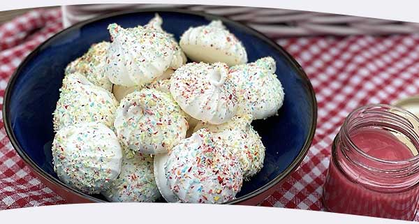 Rosie’s Colourful Coconut Meringue kisses with a summer berry curd